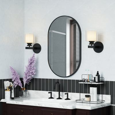 20 in. W x 32 in. H Oval Framed Wall Mount Bathroom Vanity Mirror in Matte Black